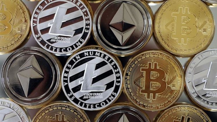 Various cryptocurrencies are illustrated as physical coins
